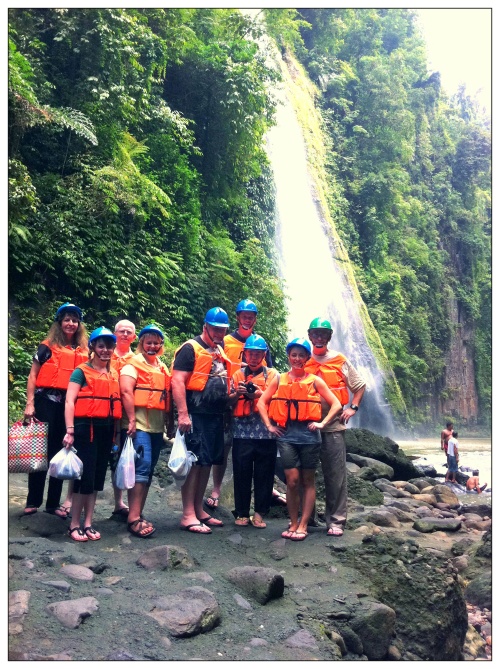 Group in front of waterfall 